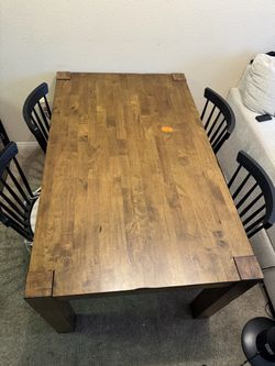 Wooden Dining Table with 6 Spindle-Back black Chairs with cushion