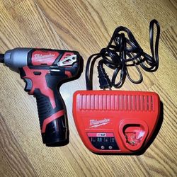 Milwaukee M12 12V Lithium-lon Cordless 1/4 in. Hex Impact With battery and charger