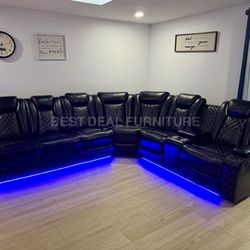 Black power reclining sectional couch