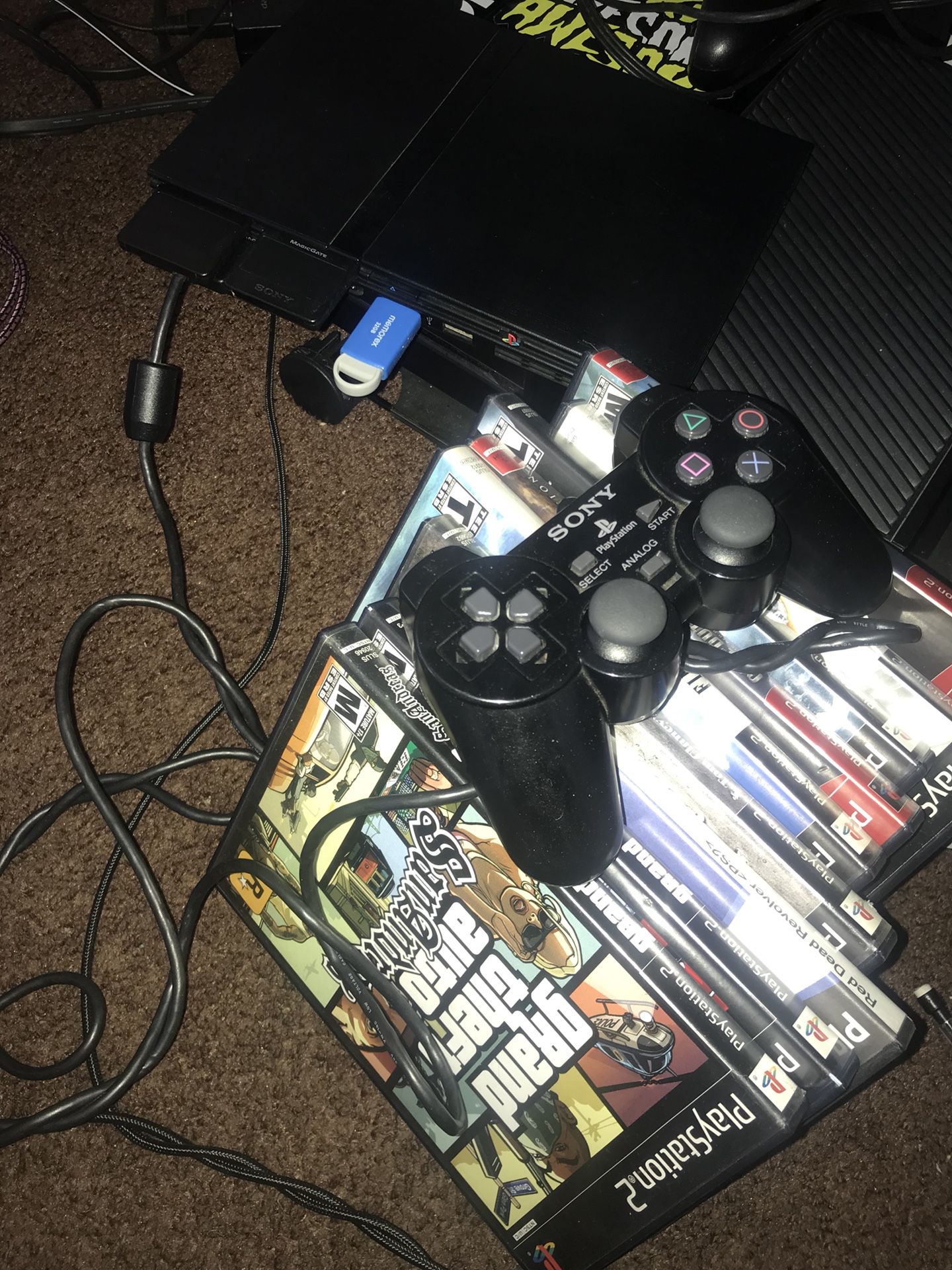 PS2 slim Softmodded with game discs and on flash drive