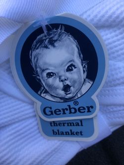 Two baby blankets, new with tags, safety- first adjustable multi-purpose strap, and Under the Pillow Baby Tooth Finder with Glow Star and Fairy Dust