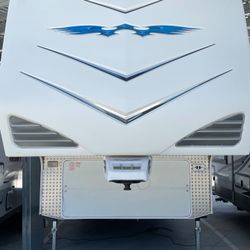 2009 Weekend Warrior CLD 40’ Trailer with two slides, 12’ garage