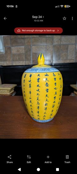 10" x 6" Vintage Chinese yellow-glazed porcelain lidded ginger jar featuring underglaze blue calligraphy script and Greek border patterns.