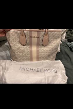 MK purse with cross body and bag cover.