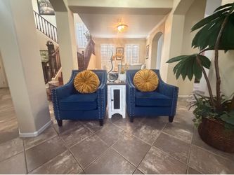 Beautiful set of two Jaclyn blue velvet tufted club chairs in excellent conditions