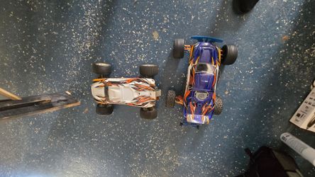 Rc cars two rustler brushless systems ready to run upgrades on one the other throw back 2 wheel drive no charger can show both works