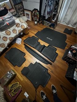 Toyota RAV4 all-weather rubber floor mats, liners, and a cargo cover