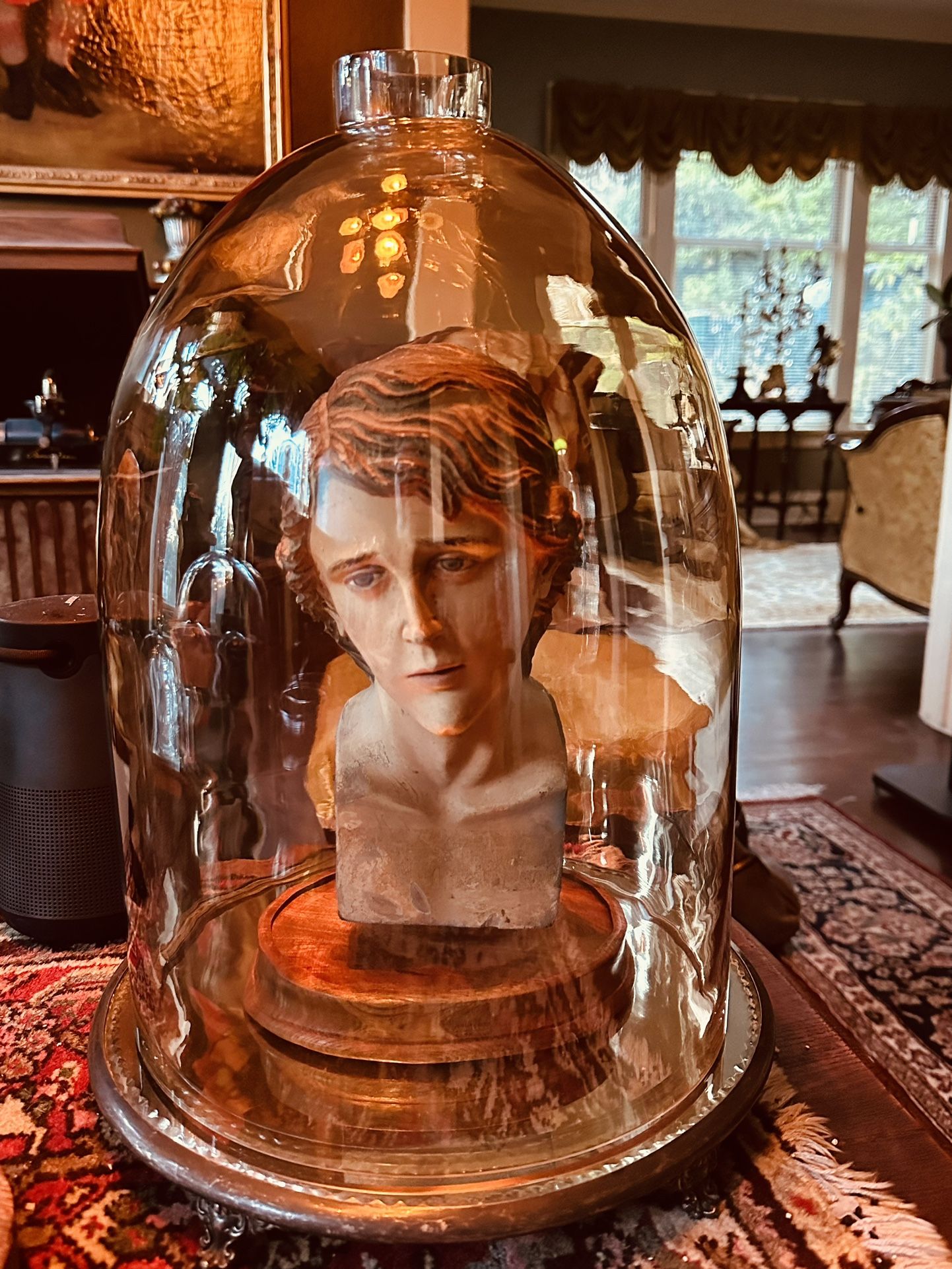 Antique Santos Head In glass dome