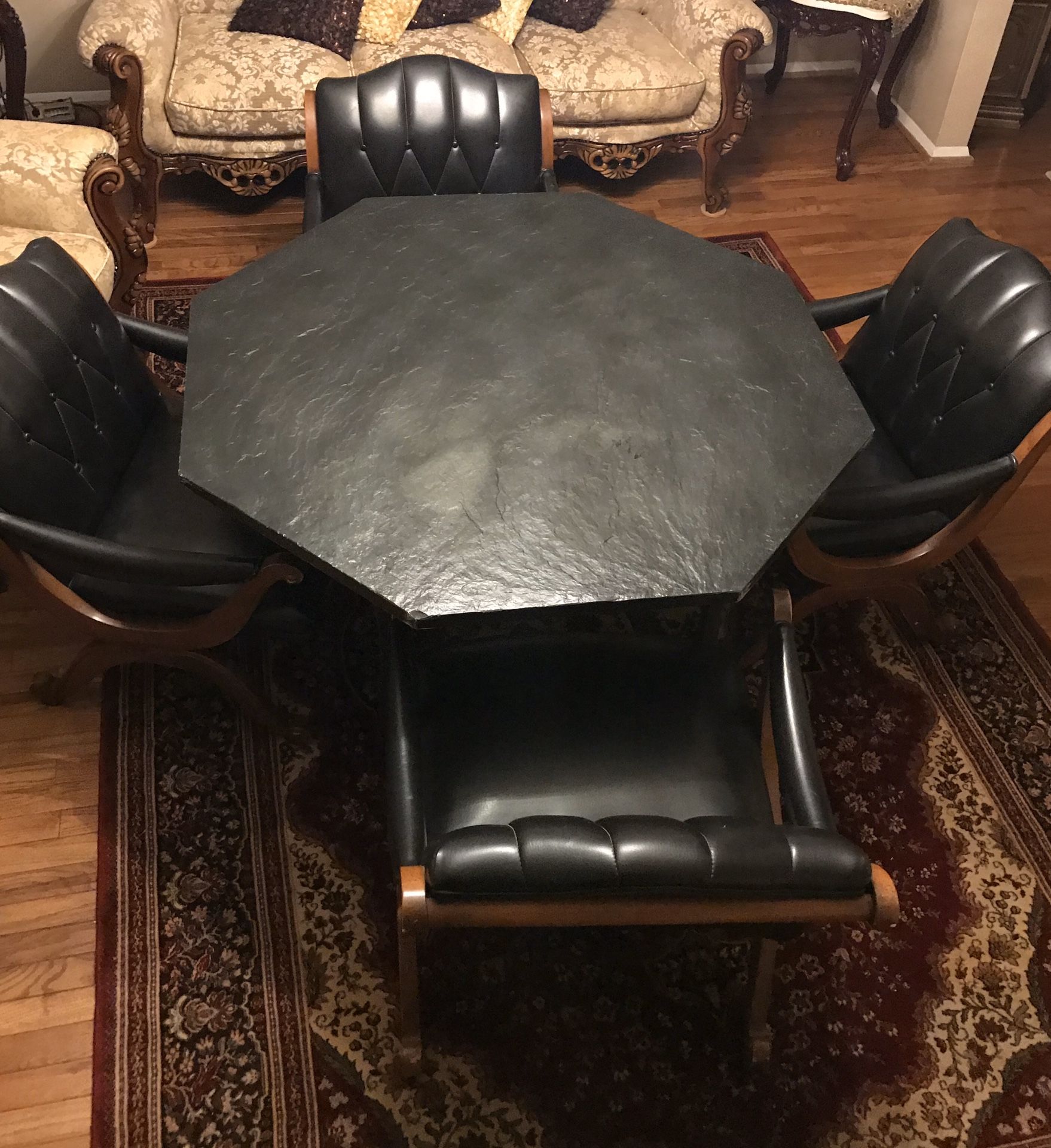 Vintage dining table heavy stone top 30”h50”L with 4 real leather chairs and free glass shelves available for pick up Asap