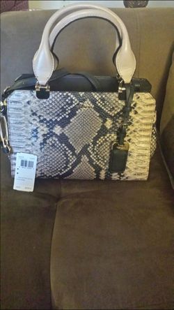 Perfect condition Authentic COACH Python mini Lexington