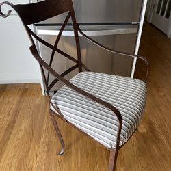 Wrought iron sitting chair by Bombay company.. 