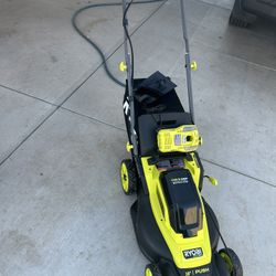 RYOBI ONE+ 18V 13 in. Cordless Battery Walk Behind Push Lawn Mower with 4.0 Ah Battery and Charger