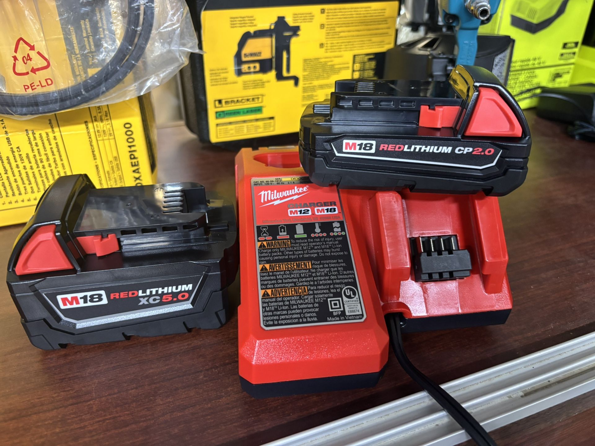 Milwaukee M18 18-Volt Lithium-Ion Starter Kit with One 5.0 Ah and One 2.0 Ah Battery and Charger