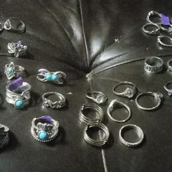 42 Silver Plated Wont Turn Rings For $60