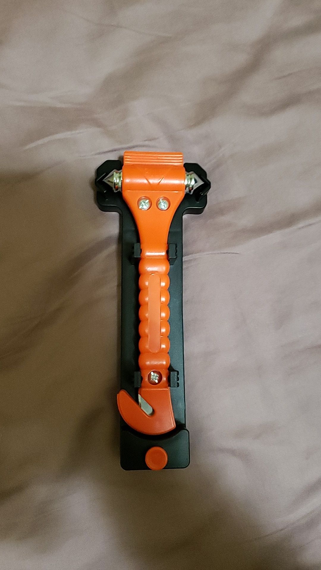 Emergency hammer with seat belt cutter