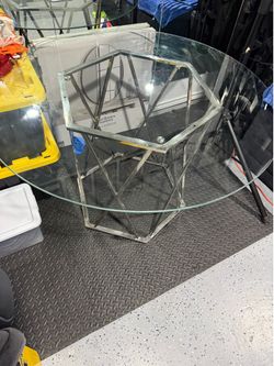 Glass round dining table with metal base