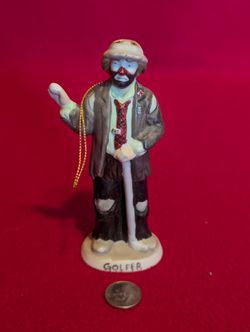Vintage Emmett Kelly Jr. "Golfer" porcelain clown figurine by Flambro.