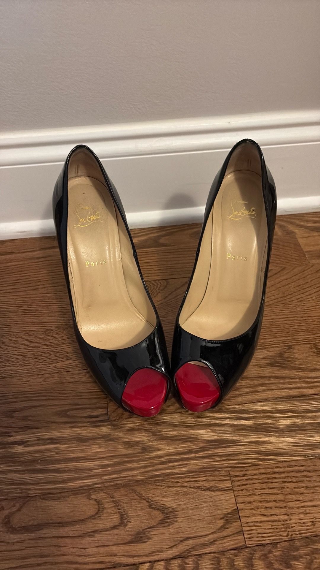 Christian Louboutin patent leather pumps