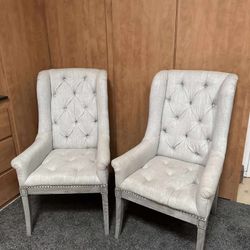 Two Tufted Accent Chairs