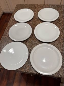 6 white dinner plates 2 are Pottery Barn
