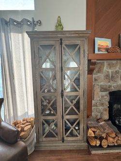 Curio cabinet with glass doors