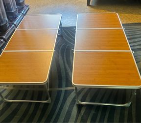 folding portable table light wait $25 each or $40 x 2 folding tables