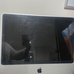 Apple desk top computer, hp keyboard and printer