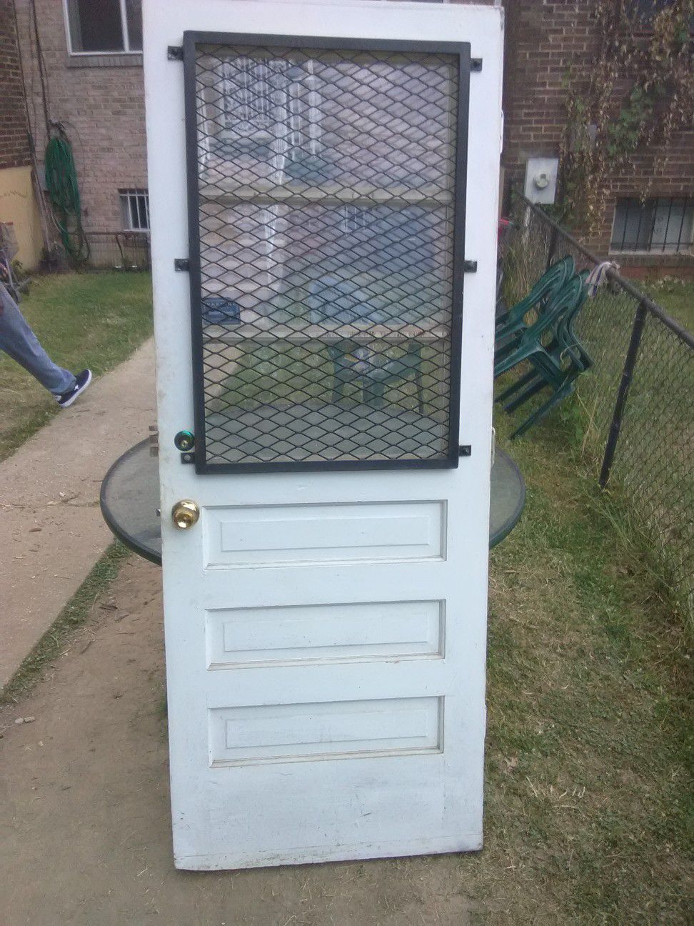 82" x 32" Exterior Security Door with Stainless Steel grate, door knob fixtures,hinges, and lock fixture with keys