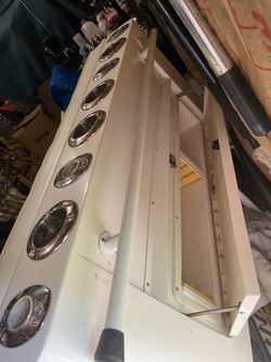 Intrepid custom seat, rocket launcher tackle center and electric seat adjustment with foot rest