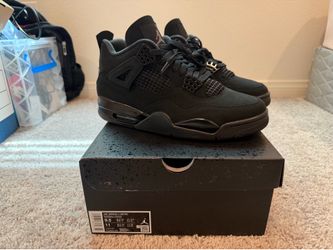 Brand new size 9.5 black cat Jordan 4