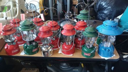 Several different coleman lanterns