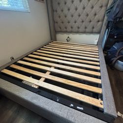 Ashley Upholstered Gray Queen Bed Frame  