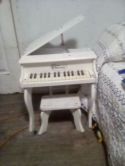 Mine white piano made by Ture Harmony