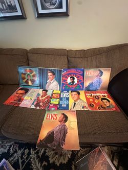9 vintage Elvis Presley vinyl record albums featuring iconic titles like Blue Hawaii and Elvis' Golden