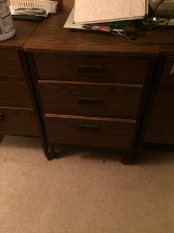 Brown wooden 3 drawer rolling chest