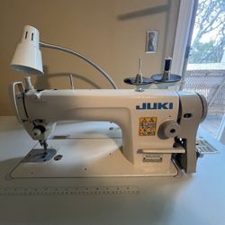 Juki Model # DDL8700 Single Needle Seeing Machine w/table  Single Needle Lock stitch