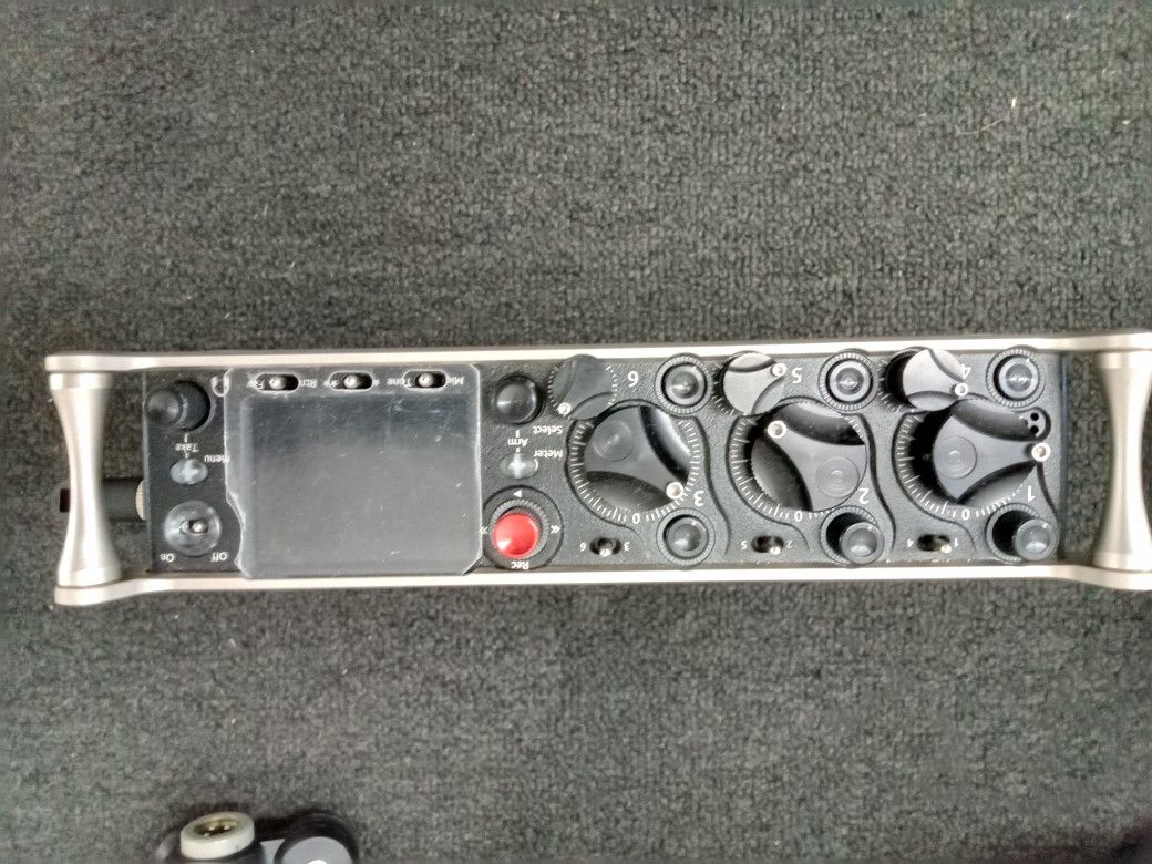 Sound device with a microphone and headphones
