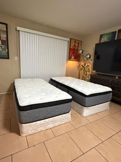 2 VERY NICE LIKE NEW XL TWIN MATTRESSES AND BOXSPRINGS FOR SALE! IN EXCELLENT CONDITION, FREE DELIVERY