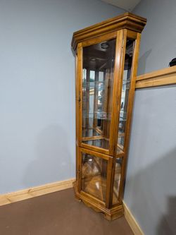 Vintage wood corner curio cabinet