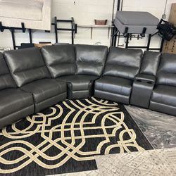 New Power Reclining Sectional.  Grey Or Black Leather-Aire.  133”x117”x41”H.  Free Delivery!