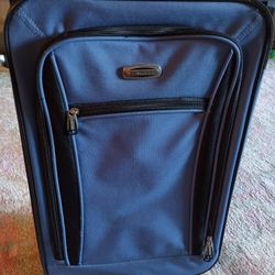 Blue Travelers Club Suitcase.
