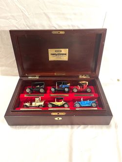 Mint condition with wood display case matchbox, unique connoisseurs classic car set of six. Retails for $120.