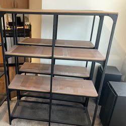 FJÄLLBO 2 Shelving units black, / wood measuring width 39 3/8x53 1/2 tall  An airy and stable shelving unit that is perfect when you want to create a 