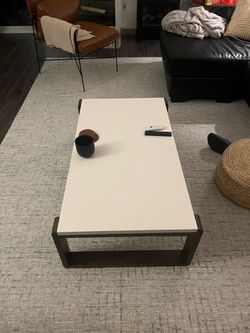 Modern White Coffee Table with Dark Wood Base