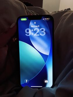 iPhone 13 , black, locked to cricket, amazing condition