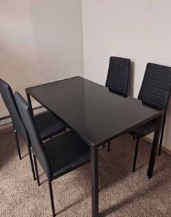 Comedor negro 4 sillas (nuevo en su caja)