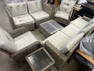 New, outdoor patio set with swivel chairs