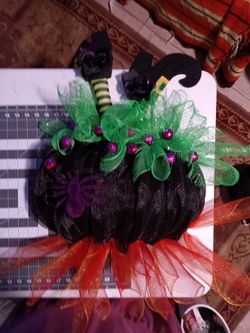 Halloween witch fell in her cauldron wresth