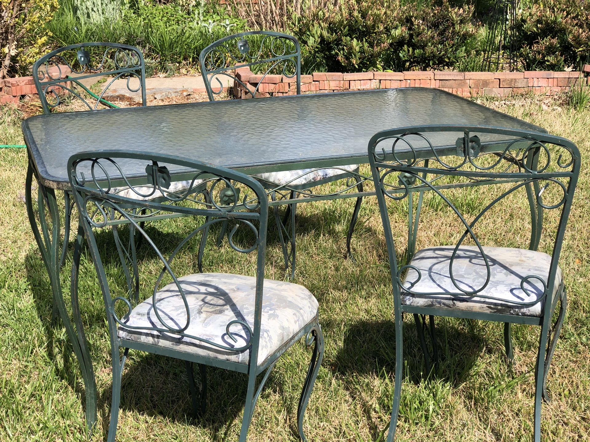 Vintage wrought iron & glass patio/dining set 4 chairs + table for