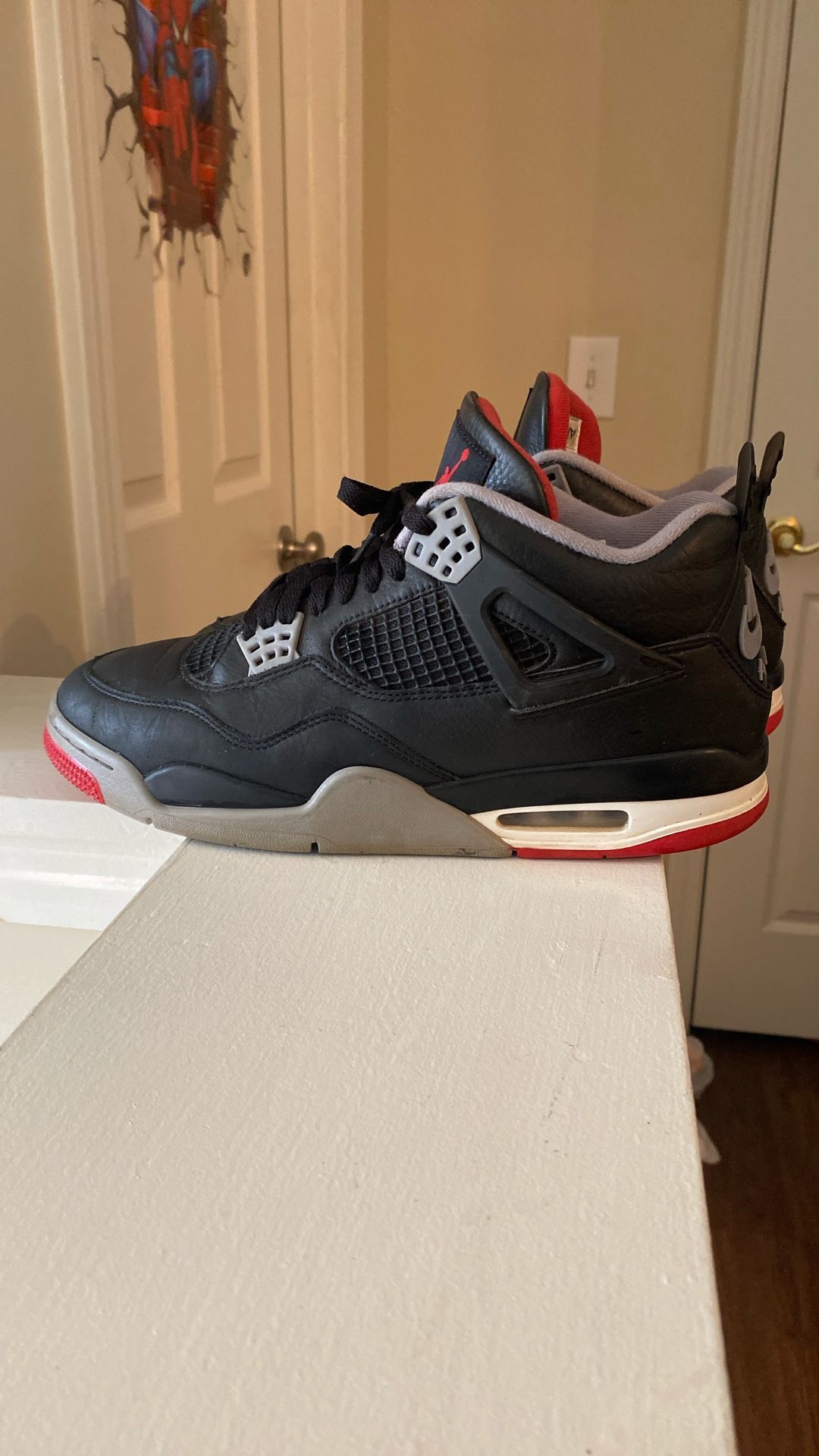 Jordan 4 Retro Bred Reimagined throw a price